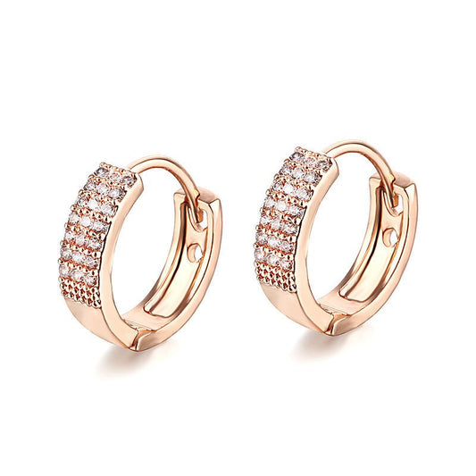 Boucles d'oreilles géométriques en zircon micro-incrustés pour femmes.