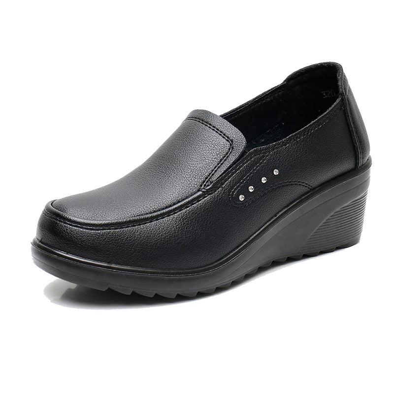 Women's wedge shoes in soft leather, mid heel.