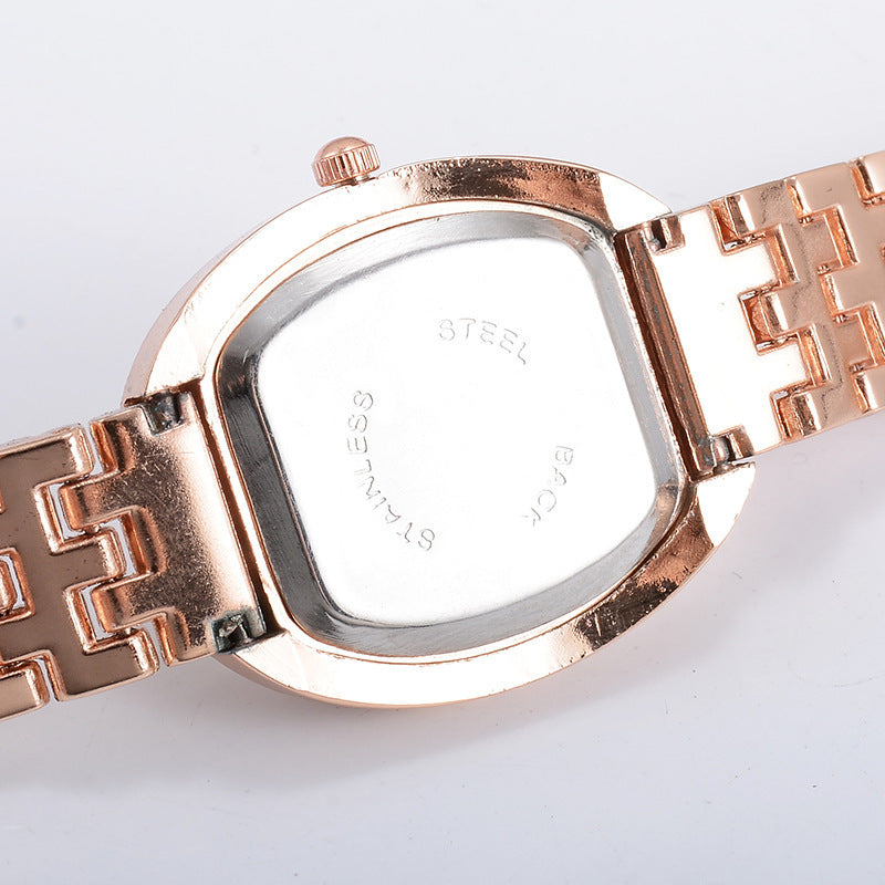 Montre à quartz pour femmes, à la mode et décontractée, avec cadran ovale et diamants