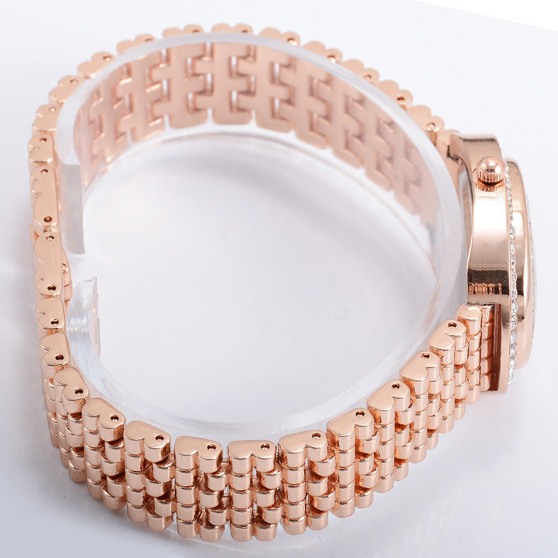 Montre à quartz pour femmes, à la mode et décontractée, avec cadran ovale et diamants