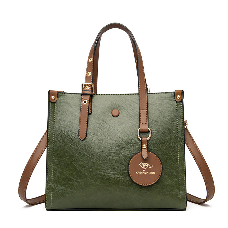 Elegant women's bag in oil waxed cowhide leather for daily commuting